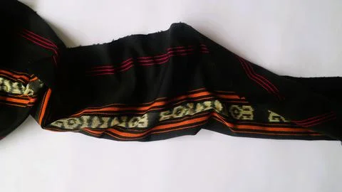 Woven textile with unique pattern from Indonesia, textured fabric background Stock Photos