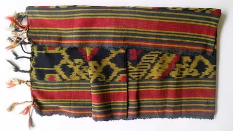 Woven textile with unique pattern from Indonesia, textured fabric background Stock Photos