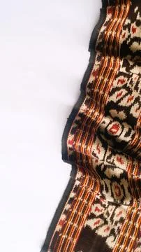 Woven textile with unique pattern from Indonesia, textured fabric background Stock Photos