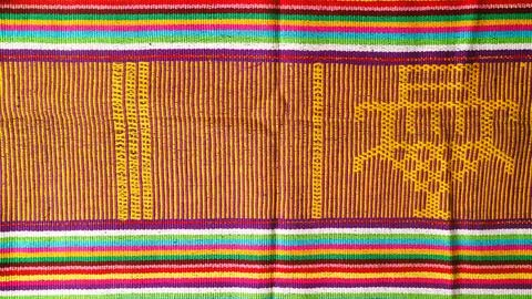 Woven textile with unique pattern from Indonesia, textured fabric background Stock Photos