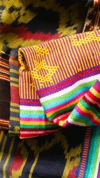 Woven textile with unique pattern from Indonesia, textured fabric background Stock Photos