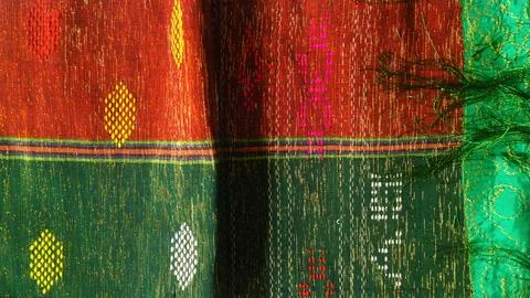 Woven textile with unique pattern from Indonesia, textured fabric background Stock Photos