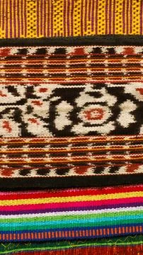 Woven textile with unique pattern from Indonesia, textured fabric background Foto stock
