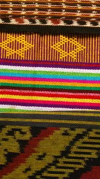 Woven textile with unique pattern from Indonesia, textured fabric background Stock Photos