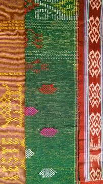 Woven textile with unique pattern from Indonesia, textured fabric background Stock Photos