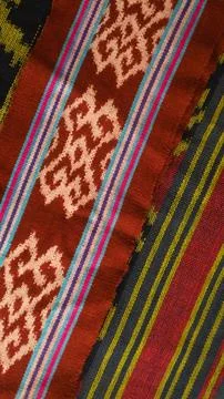 Woven textile with unique pattern from Indonesia, textured fabric background Foto stock
