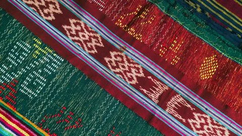 Woven textile with unique pattern from Indonesia, textured fabric background Stock Photos