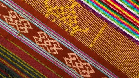 Woven textile with unique pattern from Indonesia, textured fabric background Foto stock
