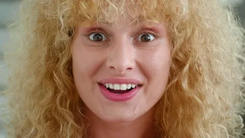 WOW effect - Millennial attractive redhead woman with curly hair rejoicing Stock Footage 222135804
