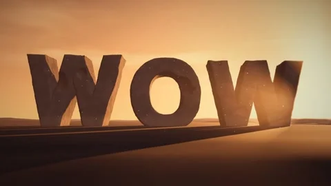 Wow Giant Eroded Stone Letters Standing in a Desert at Sunset with Volumetric Stock Footage 342222507