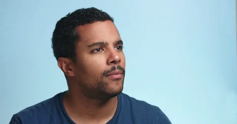 Wow surprized portrait of black mixed race man Stock Footage