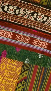 Wowen textile with unique pattern from Indonesia, textured fabric background Stock Photos