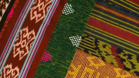 Wowen textile with unique pattern from Indonesia, textured fabric background Stock Photos