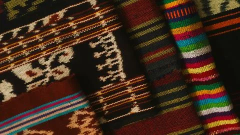 Wowen textile with unique pattern from Indonesia, textured fabric background Stock Photos