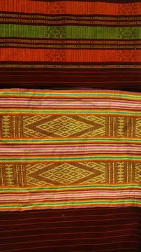 Wowen textile with unique pattern from Indonesia, textured fabric background Stock Photos