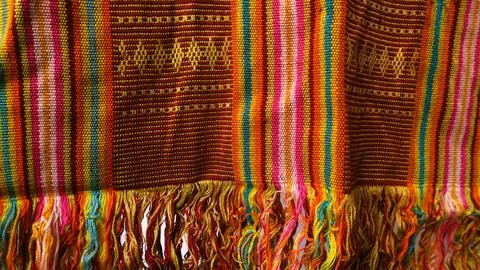 Wowen textile with unique pattern from Indonesia, textured fabric background Stock Photos