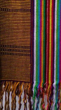 Wowen textile with unique pattern from Indonesia, textured fabric background Stock Photos