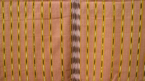 Wowen textile with unique pattern from Indonesia, textured fabric background Foto stock