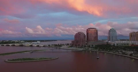 W.P.B. 4K Aerial - Phillips Point, Esperante, Two City Plaza 2 (pink sky) Stock Footage 60648674