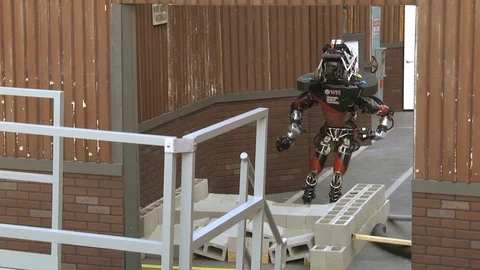 WPI-CMU's robot Warner walks on blocks in a facility 1 Stock Footage 111848997