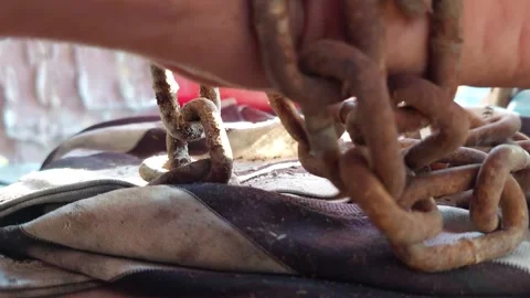 Wrap a chain around your hand Stock Footage 261968015