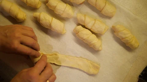 Wrap Sausage Rolls. Chef preparing Bun at home. Homemade dishes made from Dough. Stock-Footage 129094256