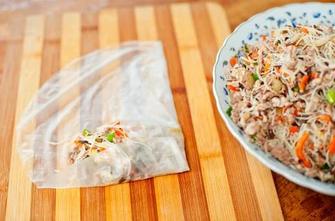 Wraping spring rolls or nem Stock Photos