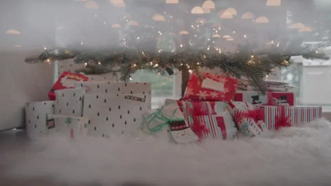 Wrapped Christmas Presents Beneath the Tree Stock Footage 270307729