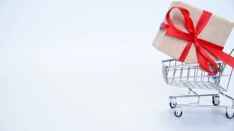Wrapped gift box with red ribbon Stock Footage 167124675
