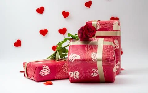 Wrapped gift boxes with a single rose Stock Photos