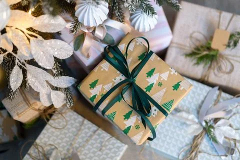 Wrapped gift boxes under Christmas tree Stock Photos