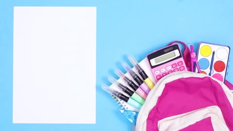 Wrapped paper appear with backpack with school tools and unwrap. Stop motion 스톡 동영상 157346470