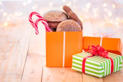 Wrapped presents with Xmas sweets Stock Photos