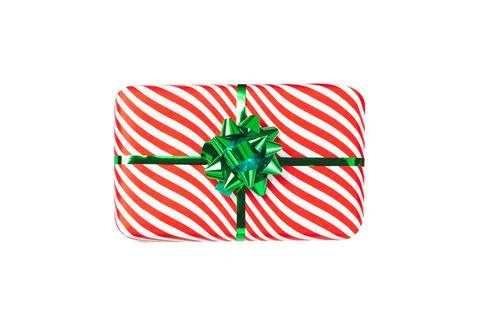 Wrapped red gift box with shiny green ribbon bow, object isolated on white ba Stock Photos