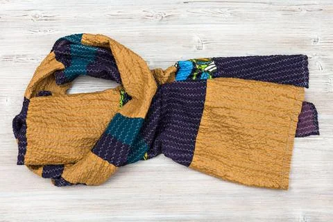Wrapped stitched silk patchwork scarf workshop on sewing a patchwork scarf... Fotos de archivo