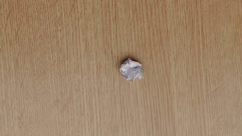 Wrapping blank sheet of paper. Stop motion animation Stock Footage 69747157