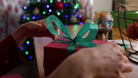 Wrapping Christmas gift. Stock Footage 219284002