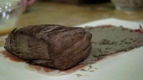 Wrapping meat with pastry Stock Footage 79507979