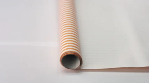 Wrapping paper on a white surface Stock Footage 68849677