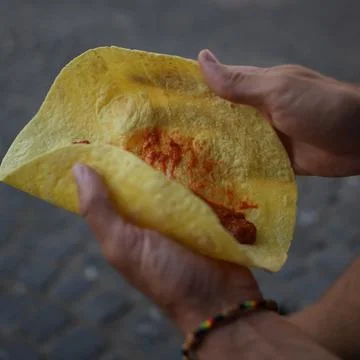 Wrapping something into a tortilla wrap Stock-Fotos