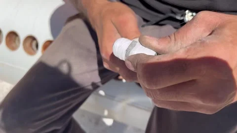 Wrapping Thread Seal Tape on a Pipe Fitting Stock Footage 345209889