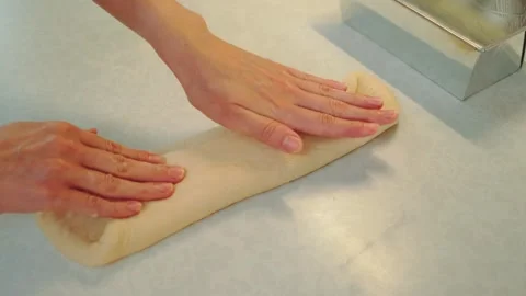 Wrapping yeast dough in the shape of an envelope Stock-Footage 249713600