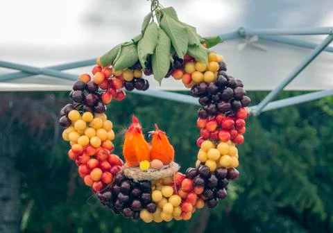 Wreath of cherries with chicks. Stock Photos