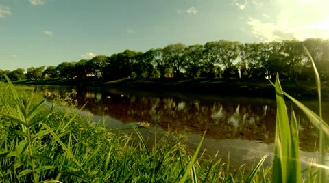 Wreath floating down the river Stock Footage 37980450