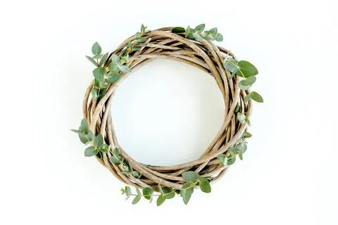 Wreath frame made of branches eucalyptus and leaves isolated on white background Stock Photos