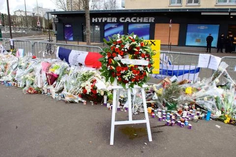 The wreath left outside the Hyper Cacher kosher market in Paris, France, b... Stock Photos