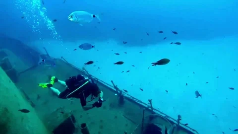 Wreck Diver diving a tugboat 스톡 동영상 96432909