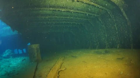 Wreck inside view in underwater world of Truk Islands. Stockbeeldmateriaal 117574877