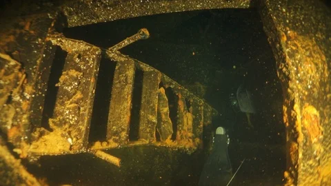 Wreck inside view in underwater world of Truk Islands. 動画素材 117575250