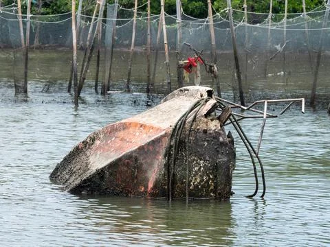 Wreck of plastic speedboat Stock Photos